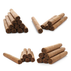 Set of cigars wrapped in tobacco leaves on white background