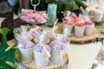 Close up view of many gift bags for guests attending a party or event. Celebration and party concept.