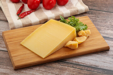 Parmesan hard cheese with small pieces