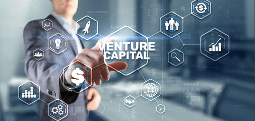 Venture capital. Investor capital. Businessman pressing virtual screen inscription