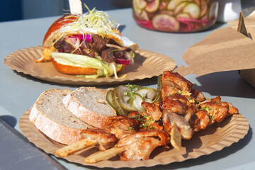 Beef BBQ skewer, grilled por meat in homemade BBQ sauce. Asian street food market at Prague, Czech Republic.