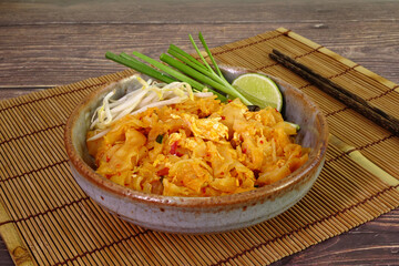 Phuket style Stir-fried Rice Noodles with spicy hot chili pepper sauce (Kuai Teaw Gui)