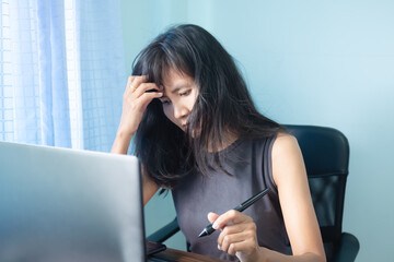 Alone woman stress and use computer laptop. staff work in office with be nervous because problem job. technology for business or finance concept.