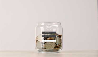 Many coins in a bottle on the table with login icon, saving money for future , loan investment concept , vintage tone