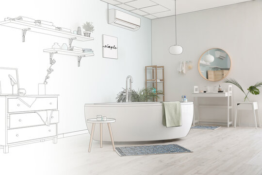 New interior of modern bathroom with stylish bathtub