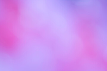 Blurred purple and pink gradient abstract background.