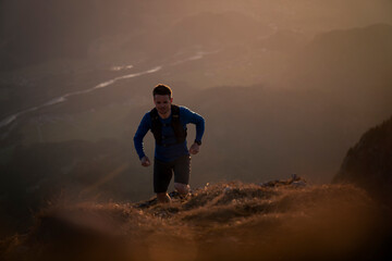 Hiker moving up on mountain