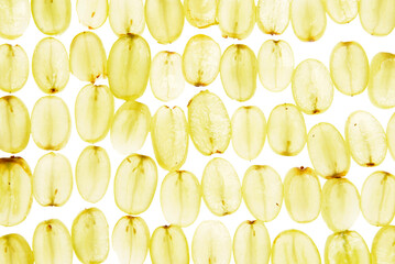 Ripe cut green grapes on white background