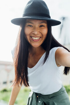 Happy Beautiful Woman Wearing Hat Enjoying Sunny Day