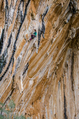 The girl climber climbs.