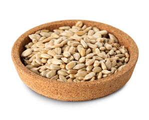 Bowl with peeled sunflower seeds on white background