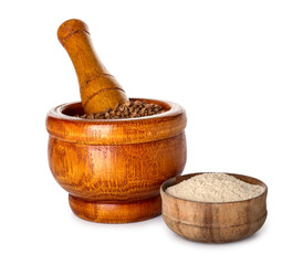 Mortar with pestle, buckwheat grains and bowl of flour on white background