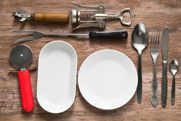 Kitchenware on wooden background