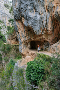 Spain, Province of Leon, Leon,Senior woman hiking in Picos de Europa mountains