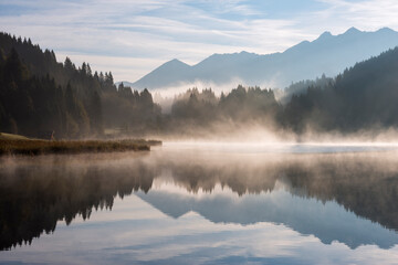 Germany, Bavaria, Geroldsee lake at foggy morning