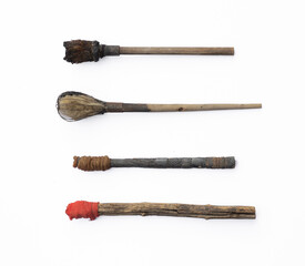 ancient wooden torches isolated on white background