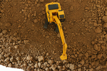 Excavators  are digging soil with  in the construction site ,Top view