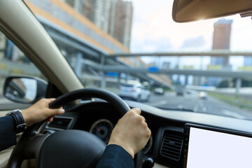 People driving car on city road