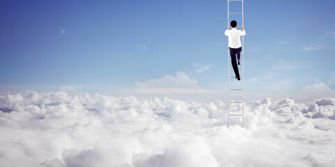 Businessman climb on ladder with blue sky background