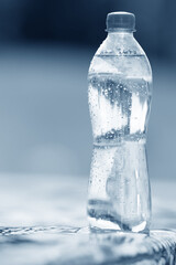 bottle of water in blue tones
