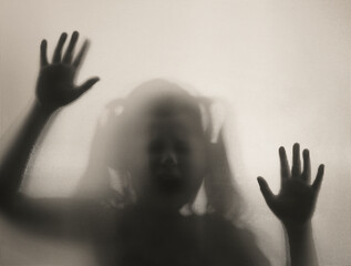 Fototapeta Shadowy figure, child behind glass - horror background obraz
