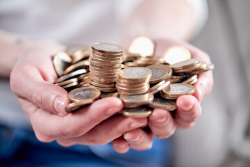 euro coins in the hands