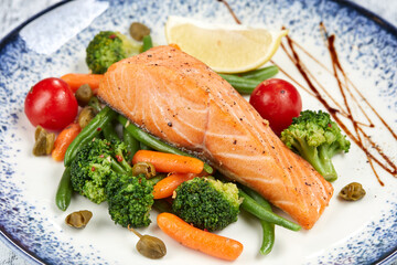 salmon steak with roasted vegetables