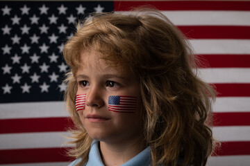 American flag on child cheek, independence day 4th of july. United States of America concept....
