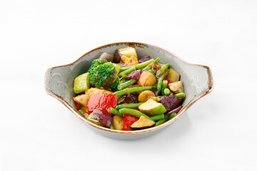 Cooked vegetable salad on a white background