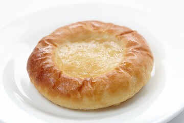 baked sweet buns on the white plate