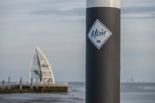Germany, Lower Saxony, Juist, Greeting sticker on coastal street light