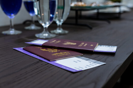 Thailand Passports And Boarding Passes On Table In Airport Vip Lounge