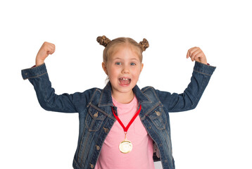 Happy child with medal. Little girl showing strength gesture isolated on white background.