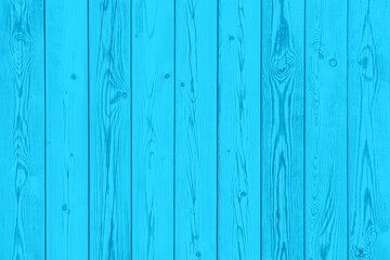 Fototapeta na wymiar Weathered blue wooden background texture. Shabby teal painted wood.