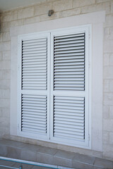 External window shutters on a residential building