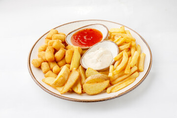 Fries with ketchup on a white background