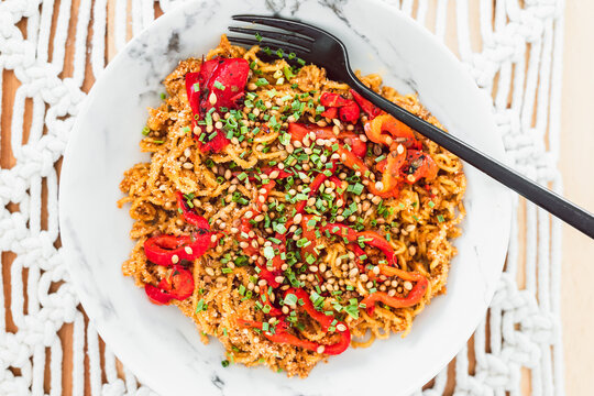 healthy plant-based food, noodles with bell pepper chives and coriander seeds
