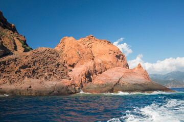 The rugged red cliffs of Punta Rossa, part of the Scandola Nature Reserve, UNESCO World Heritage Site, Porto, Corse-du-Sud