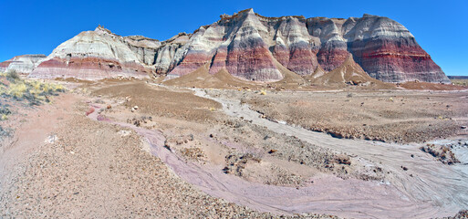 South side of Damnation Mesa on the north end of Devil's Playground in Petrified Forest National Park, Arizona