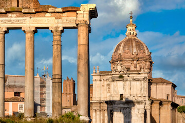 Remains of the Columns of the temple of Saturn and the dome of the church of Santi Luca e Martina,...