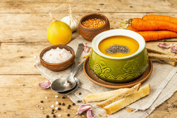 Vegetable cream soup. Traditional autumn hot food, croutons, and spices