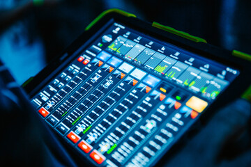 Sound and light mixer console on tablet