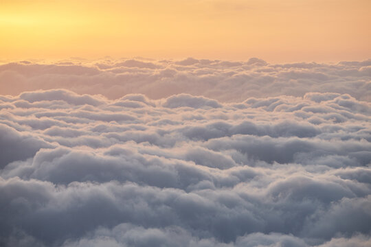 First Rays Of Sun Above The Clouds.