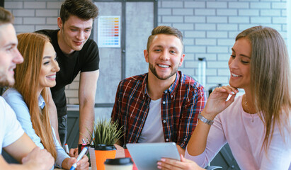 Group of young business people and designers.They working on new project.Startup concept.