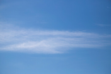 Blue sky cirrus clouds.