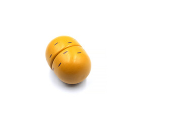 Kids toy wooden vegetables in background close up. Childrens developing wooden game. Toy potatoes