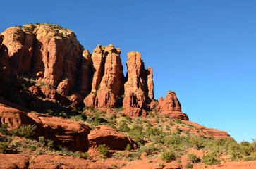 Fototapeta premium Vibrant Red Rock Formations and Blue Skies