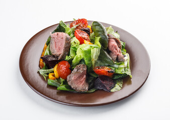 salad with roastbeef and vegetables isolated on white