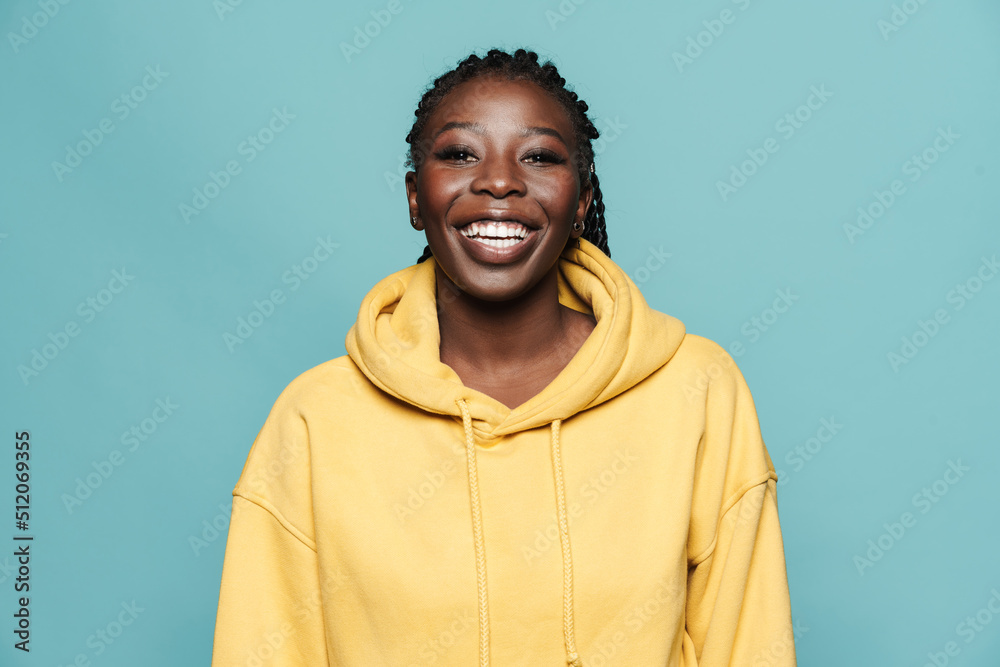 Canvas Prints young black woman wearing hoodie laughing at camera