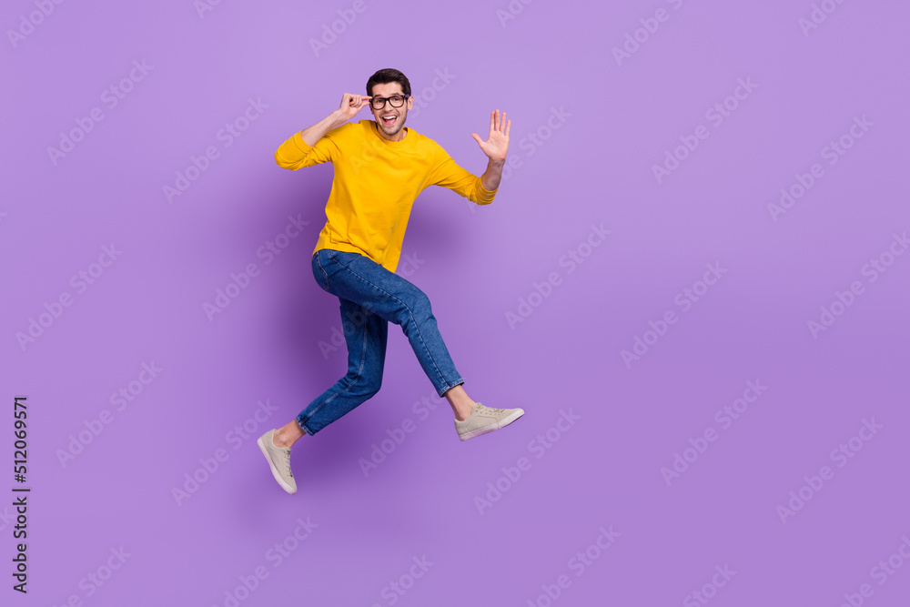 Poster Full length profile side image of overjoyed carefree man running go on vacation isolated on violet color background